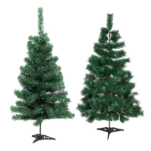 Artificial green PVC Christmas trees with metal stands in different shapes on white background
