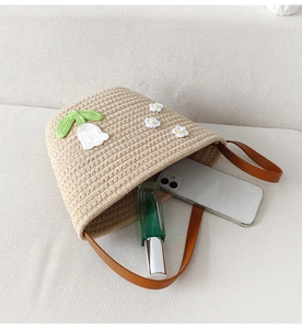 Top view of handmade crochet tote bag interior space showing flower details and capacity