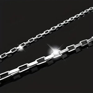 Polished silver stainless steel box chain necklace with rectangle links on black background