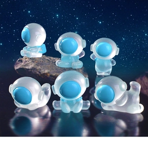 Set of 6 luminous astronaut figurines in ice blue resin for micro landscape decor
