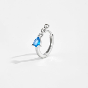 Detail of S925 silver hoop earring with blue teardrop zircon and delicate chain link