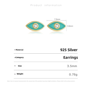 Detail view of gold-plated S925 silver evil eye stud earrings with white zircon accents