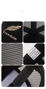 Detail of freedom feather embroidery and breathable mesh on a black trucker cap