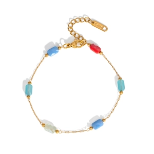 Detail of gold stainless steel bracelet featuring colorful square crystal beads and lobster clasp