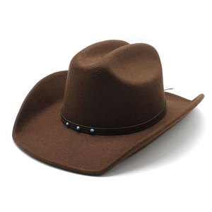Detail of wool jazz hat with brown leather band and three turquoise stone accents