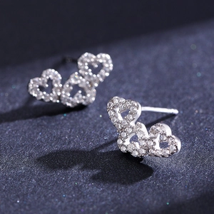 Elegant S925 sterling silver hollow heart earrings with micro-inlaid zircon crystals