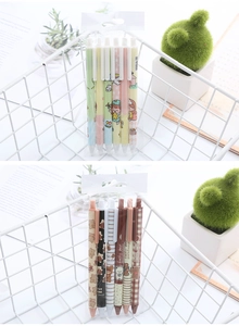 Detail of 6-pack retractable gel pens with cute cartoon girl and lucky bear patterns