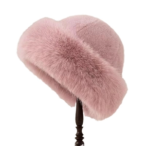 Luxurious fluffy faux fur bucket hat in pink purple for winter warmth and high-end style
