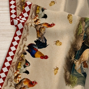 Detailed macro of linen blend fabric with rooster print and red checkered border edge
