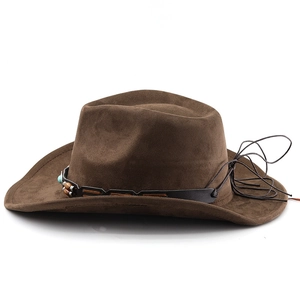Close-up of brown suede cowboy hat with ethnic beaded band and turquoise stone detail