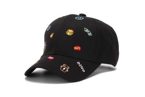 Close-up of black kids baseball cap featuring colorful cartoon animal embroidery