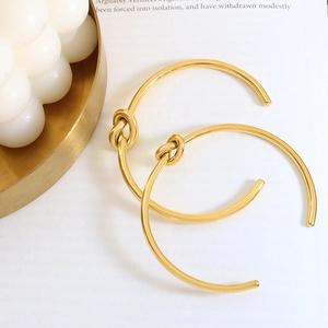 Elegant gold-plated knot-style open cuff bracelet for women with minimalist fashion design