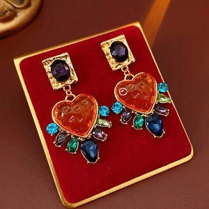 Boucles d'oreilles vintage dorées avec gemmes violettes et cœurs en cristal coloré
