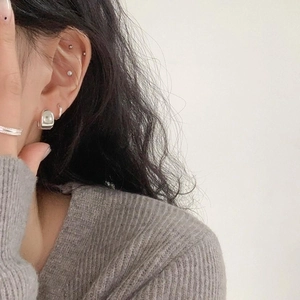 Minimalist 925 sterling silver hoop earrings and ball stud set for women shown on model