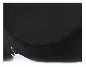 Close-up of durable black cotton stitching and white embroidery on the reversible sun hat