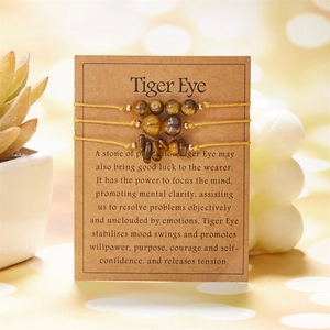 Three-piece tiger eye stone woven bracelet set with raw chips and round beads on card