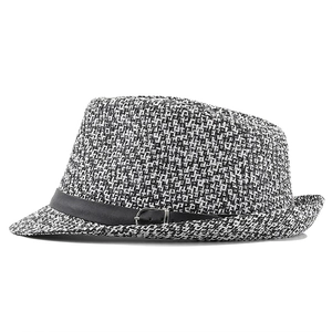 Detail of British style Panama fedora showing black and white woven texture and leather belt