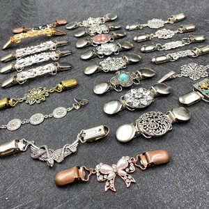 Retro sweater clips set with vintage flower and butterfly patterns in silver and gold