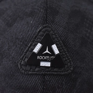 Black baseball cap featuring an embroidered triangular LED patch with ROCK lettering