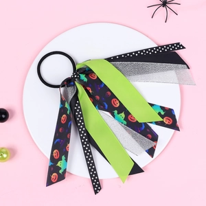 Halloween girls hair scrunchies with pumpkin ribbons and spooky spider decorations
