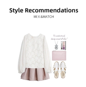 Flat lay of white lace top, pleated pink skirt, and silver deer necklace set