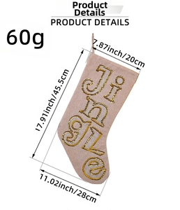 Detailed view of beige Christmas stocking with gold Jingle sequins and size dimensions