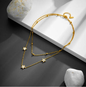 Minimalistische zweilagige 18K Gold-Edelstahlkette mit weißen Muschelstern-Anhängern