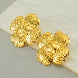 Golden sunflower earrings in 18k plated stainless steel with textured petal relief