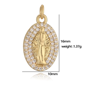 Detailed macro view of 16x10mm gold Virgin Mary pendant with clear gemstone halo