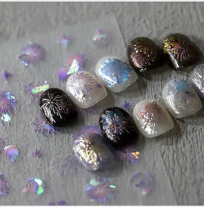 Macro view of 3D laser firework nail art stickers with metallic holographic shine on nails