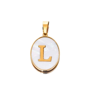 Detailed view of an oval L-letter pendant with golden frame and pearl white inlay