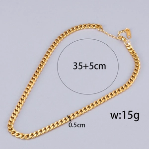 Flat lay of gold chunky Cuban chain necklace with size dimensions 35+5cm and 0.5cm width