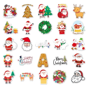 Flat lay of 25 unique Christmas cartoon stickers featuring Santa and Reindeer designs