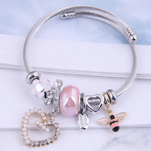 Adjustable steel wire bracelet with pink beads, heart pearl and bee charms