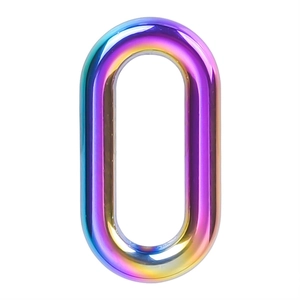 Close-up of oval rainbow gradient stainless steel link with polished metallic finish