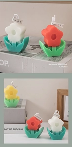 Detailed macro of flower tulip scented candles with green base and decorative labels