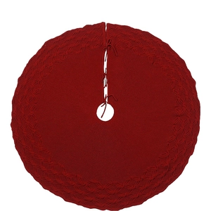 Detailed knit cable pattern on red Christmas tree skirt with secure tie closures