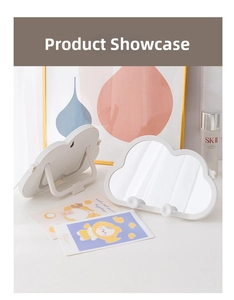 Close-up of cloud-shaped makeup mirror with adjustable white stand and hanging hook