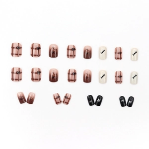 Brown plaid press-on nails with cartoon puppy, bow accents, and bone patterns