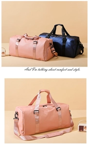 Dual colors pink and navy fitness travel bag with reinforced handles and shoulder straps