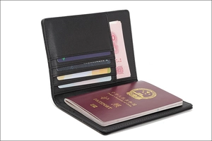 Internal view of the black leather RFID passport holder with card slots and money pocket
