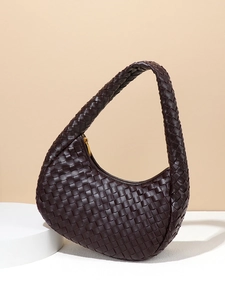 Dark brown woven leather handbag with gold zipper and curved hobo style design