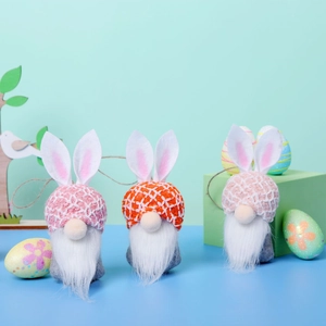 Detail of Easter gnomes with rabbit ears, knitted hats and plush textures on mint background
