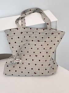 Minimalist canvas tote bag with check pattern, red polka dots and bow print detail