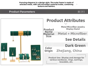 Detail of dark green microfiber jewelry stands with gold metal poles for necklace and earring
