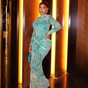 Slim fit long sleeve bodycon dress with teal tie-dye print and mesh texture