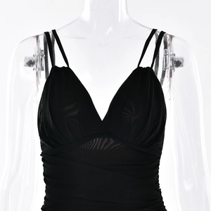 Detail of sexy deep V-neck and thin straps on black mesh slim fit dress for women