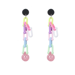Colorful acrylic link drop earrings with heart accents and a glittery pink sphere charm