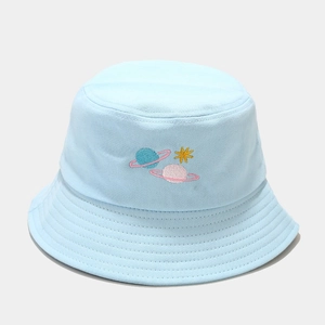Detailed embroidery of colorful planets and stars on a light blue cotton bucket hat