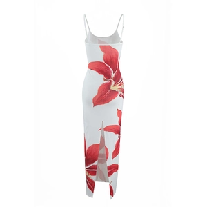 Detailed back view of white floral dress with red lilies and elegant leg slit